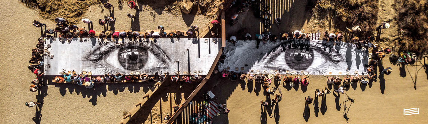JR, Migrants, Mayra, Picnic across the border, Tecate, Mexico - U.S.A., 2017